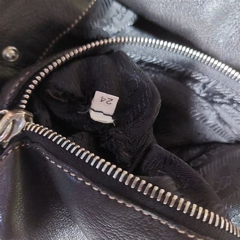 ipi zipper prada|Prada purse zip.